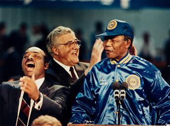 (NELSON MANDELA) A collection of 6 images depicting Nelson Mandelas public appearances in Detroit during his American tour in June, 19